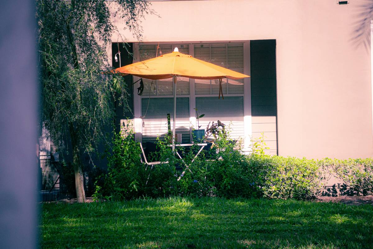 How to Choose the Perfect Umbrella for Patio Furniture (Without Melting Into a Puddle)